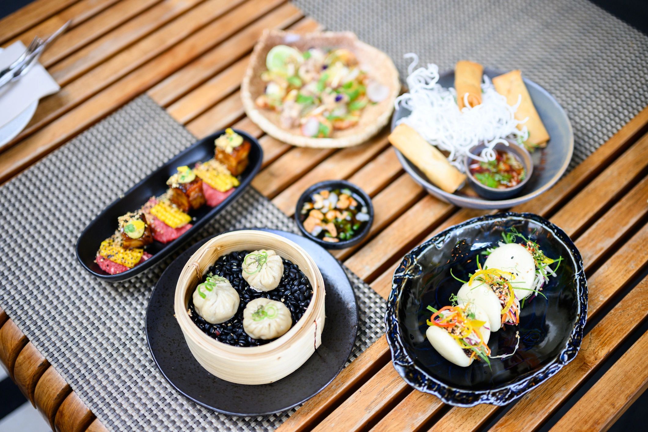 Assorted homemade Asian dishes arranged for sharing