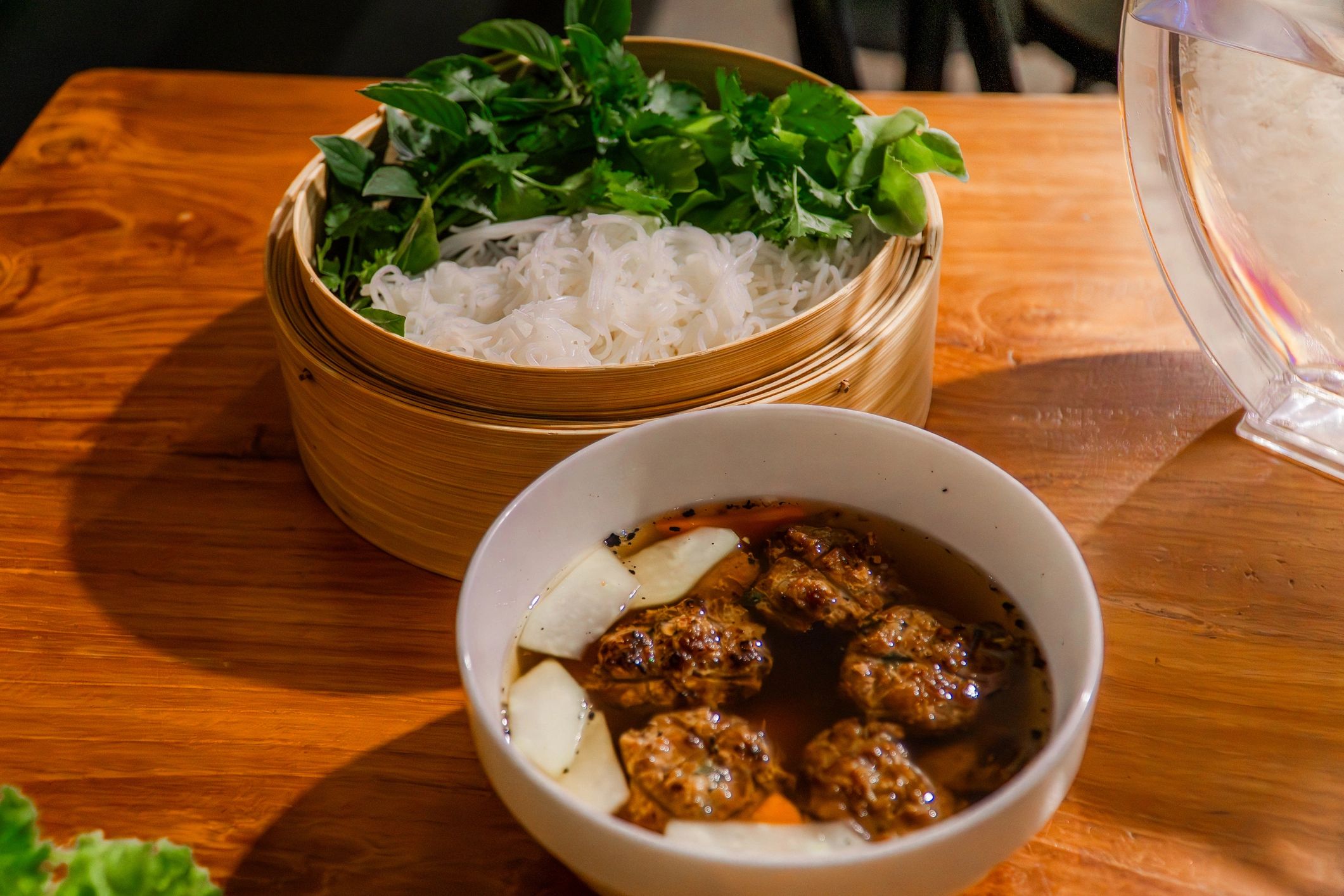 Homemade Vietnamese dishes served on a rustic table